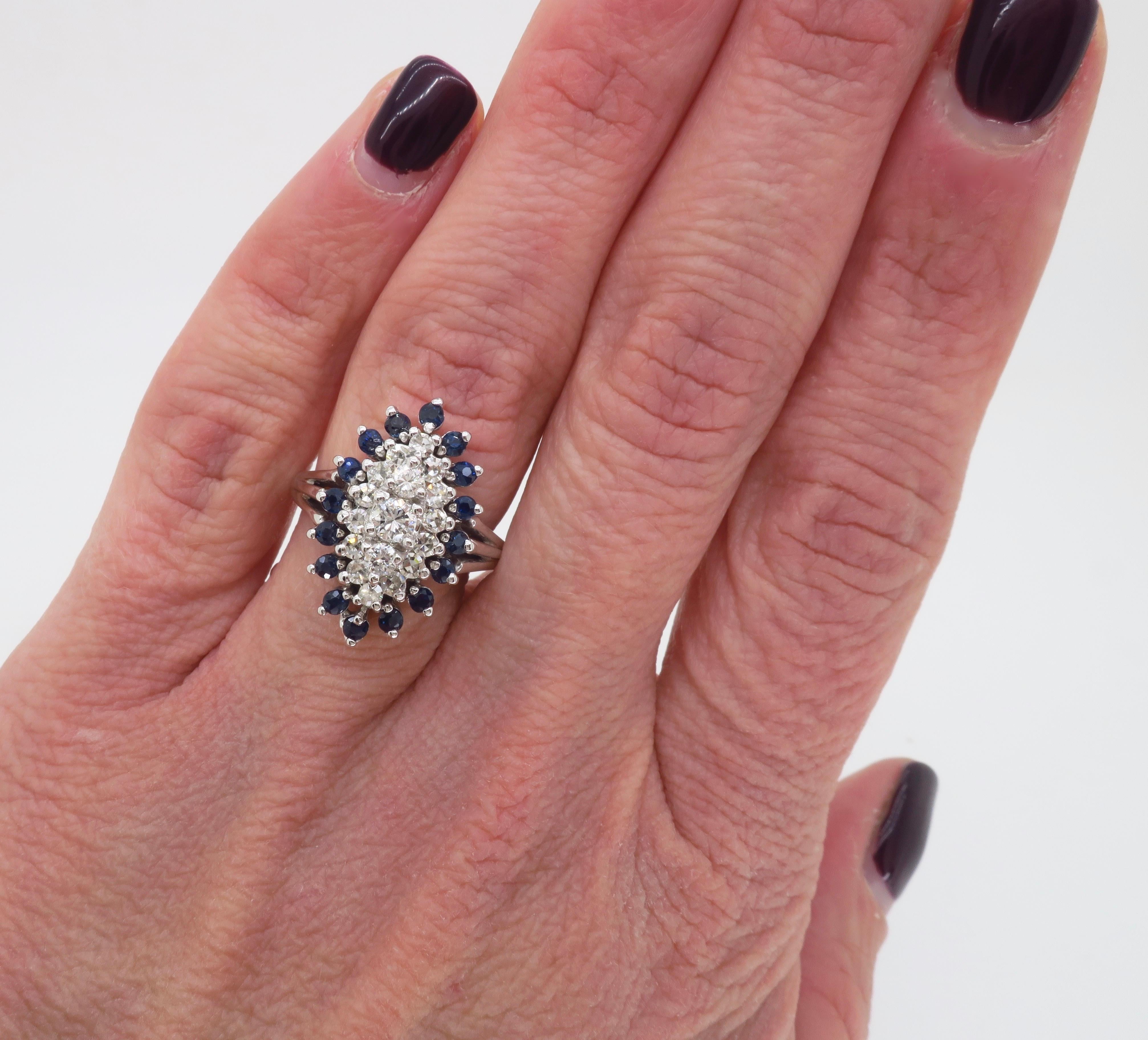 Blue Sapphire and Diamond halo ring.

Gemstone: Blue Sapphire & Diamond
Diamond Carat Weight: .95CTW
Diamond Cut: Round Cut Diamonds
Average Diamond Color: F-H
Average Diamond Clarity: VS-SI
Metal: 14K White Gold
Stamped: 
