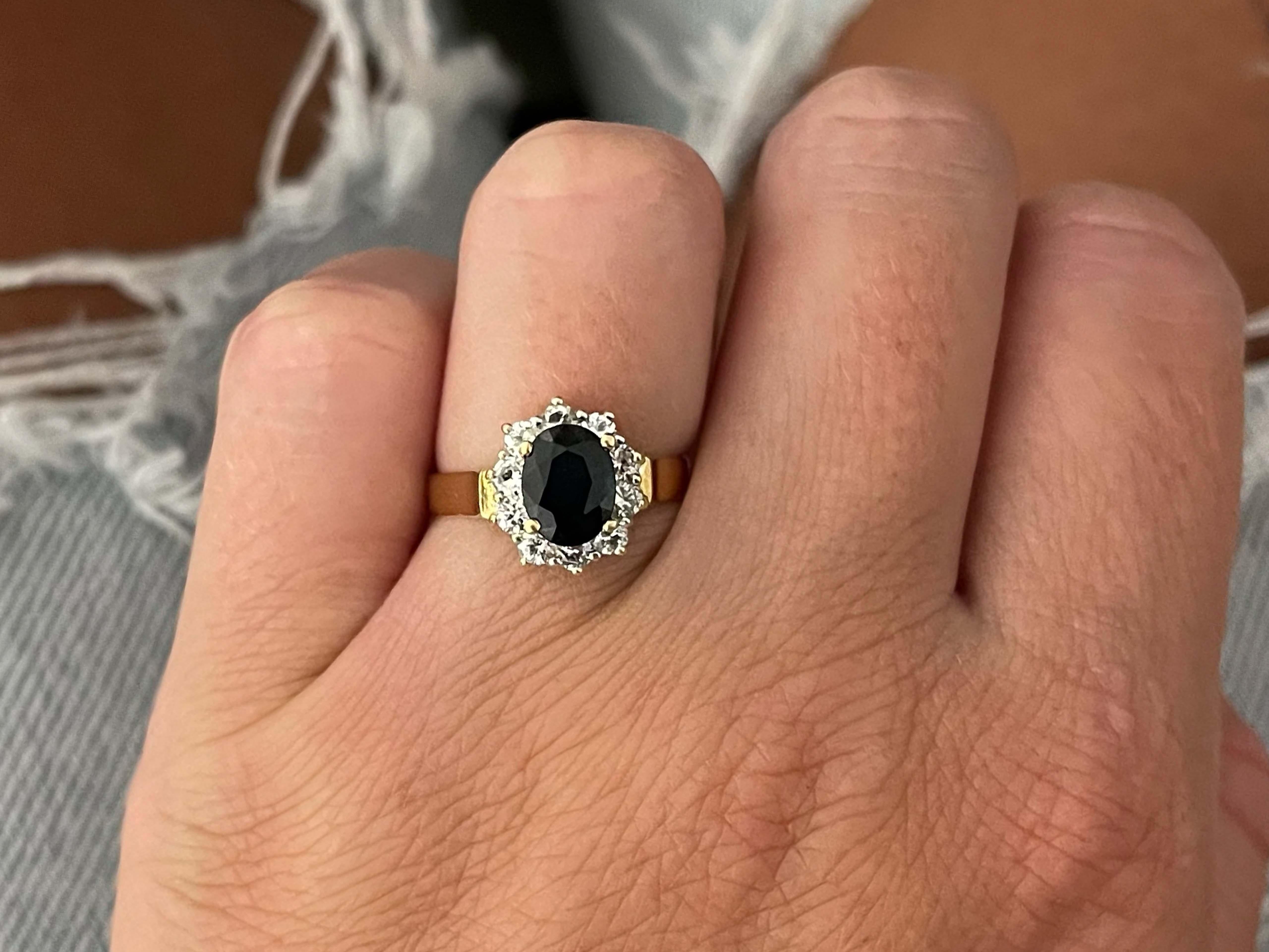 Item Specifications:

Metal: 18K Yellow Gold

Style: Statement Ring

Ring Size: 6.75 (resizing available for a fee)

Total Weight: 4.1 Grams
​
​Diamond Count: 10

Diamond Carat Weight: 0.50

Diamond Color: G

Diamond Clarity: VS

Gemstone