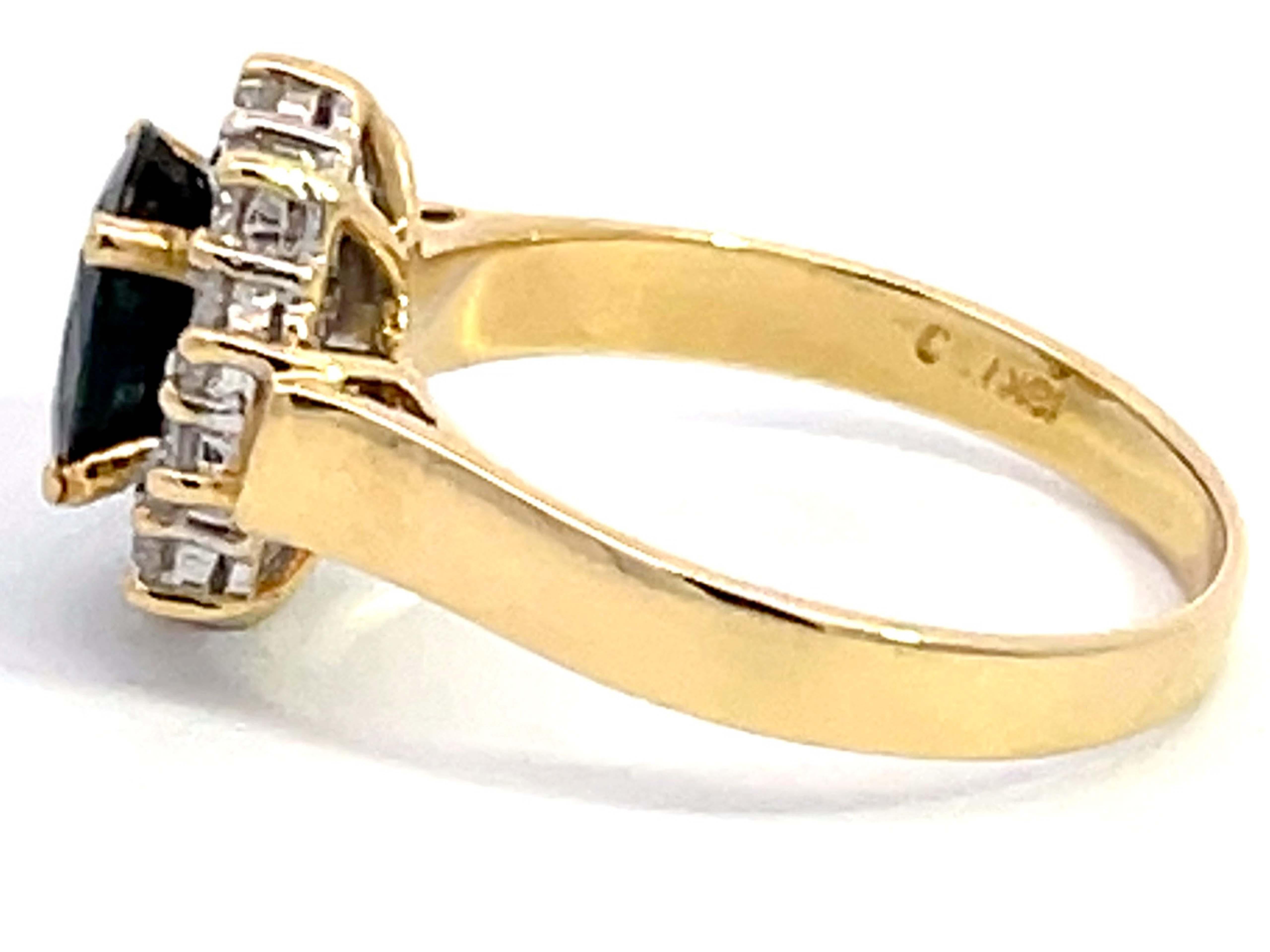 Oval Cut Blue Sapphire Diamond Halo Ring in 18k Yellow Gold For Sale