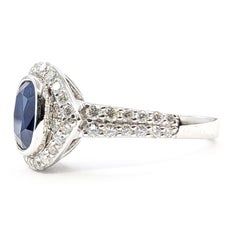 Anello con zaffiro blu e diamanti a corona in platino - GIA: 2235598107