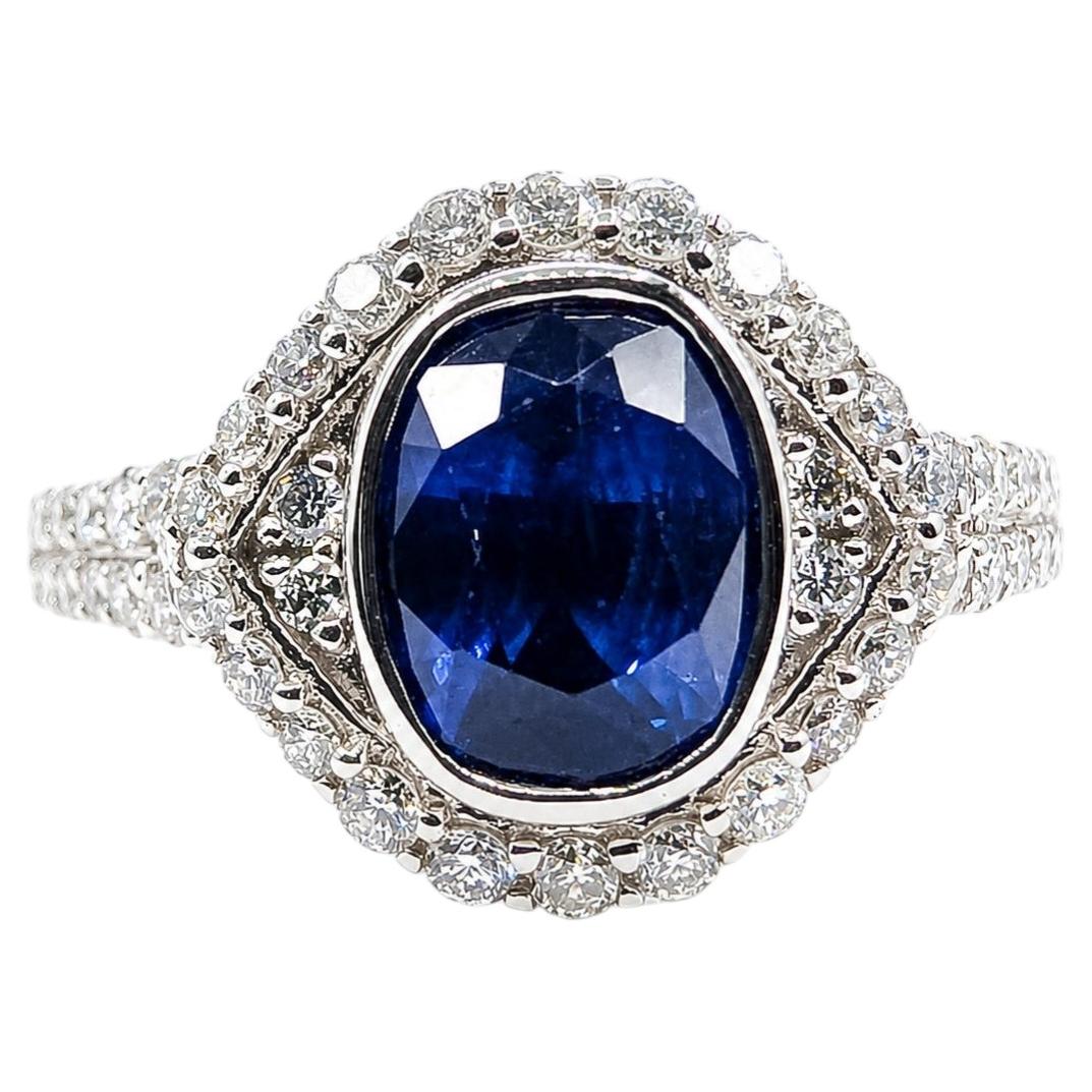 Halo-Ring aus Platin mit blauem Saphir und Diamanten – GIA: 2235598107 im Angebot