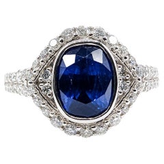 Blue Sapphire & Diamond Halo Ring in Platinum- GIA: 2235598107