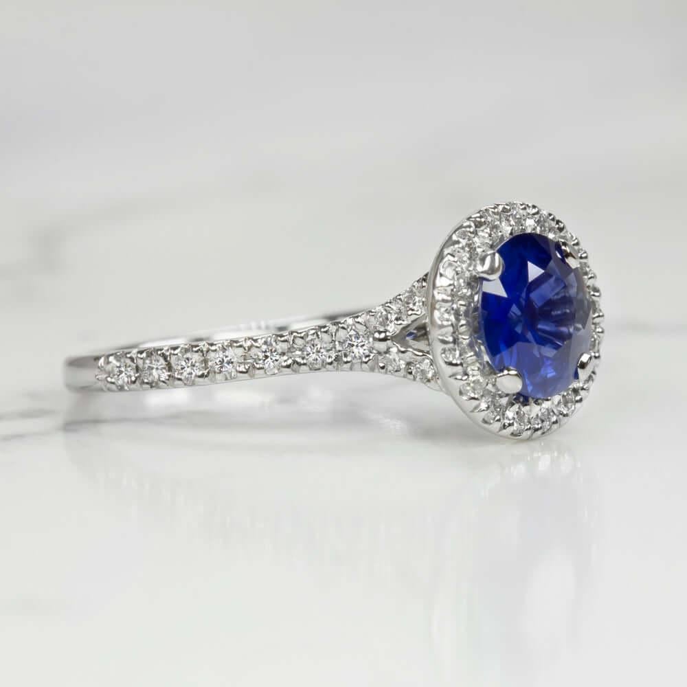 Modern Blue Sapphire Diamond Halo Solitaire Ring