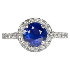 Blue Sapphire Diamond Halo Solitaire Ring