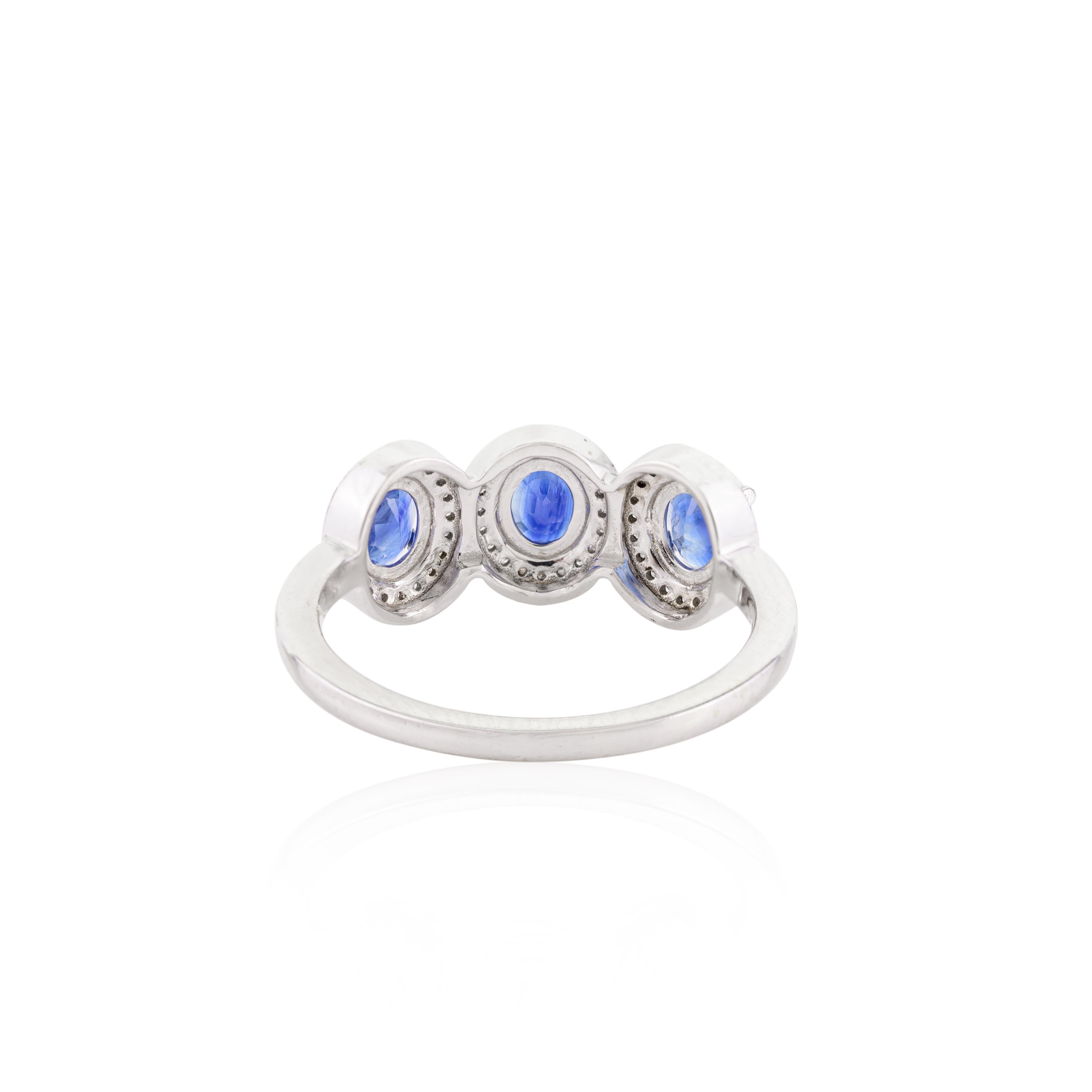 For Sale:  Blue Sapphire Diamond Halo Three Stone Engagement Ring in 14k Solid White Gold 5