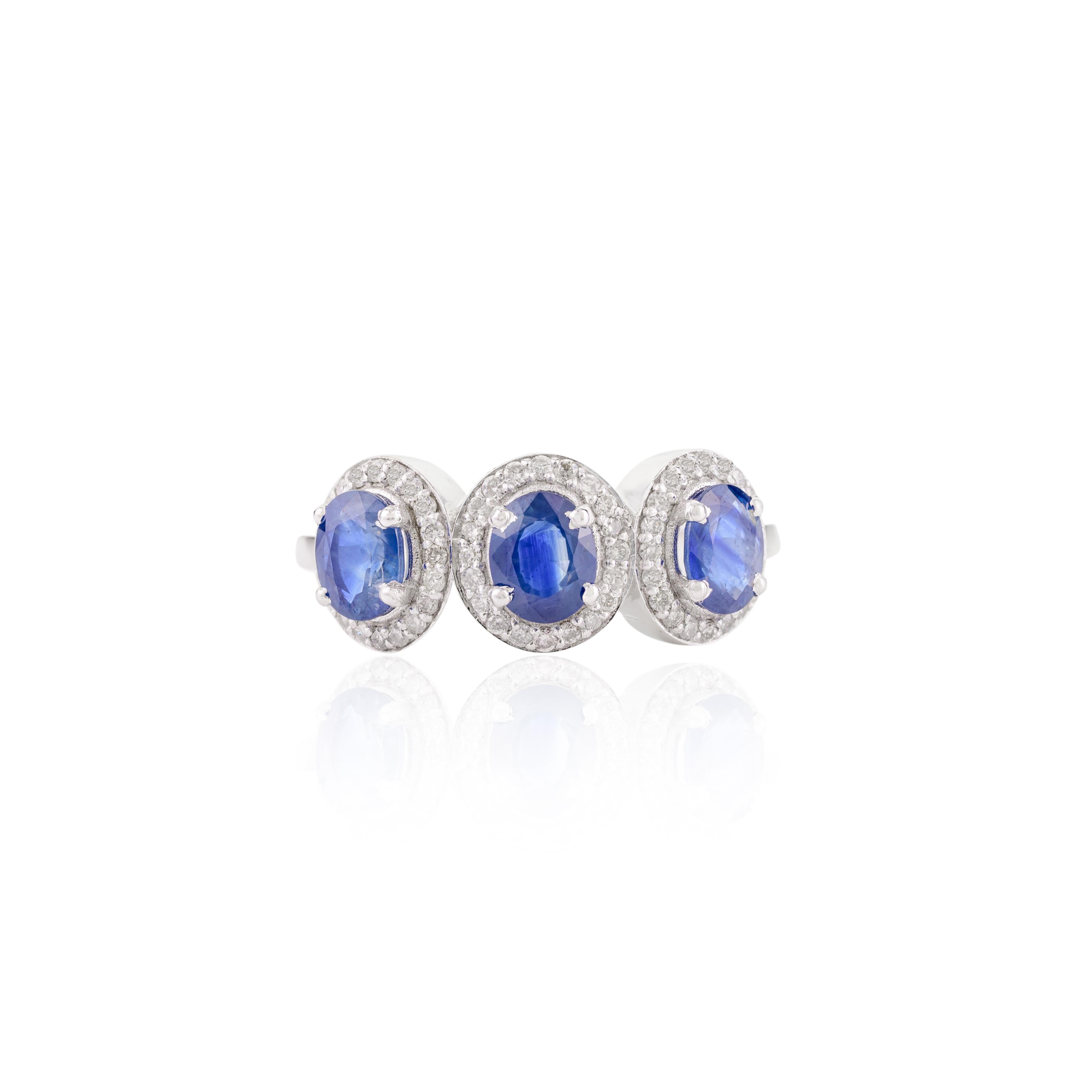 For Sale:  Blue Sapphire Diamond Halo Three Stone Engagement Ring in 14k Solid White Gold 8