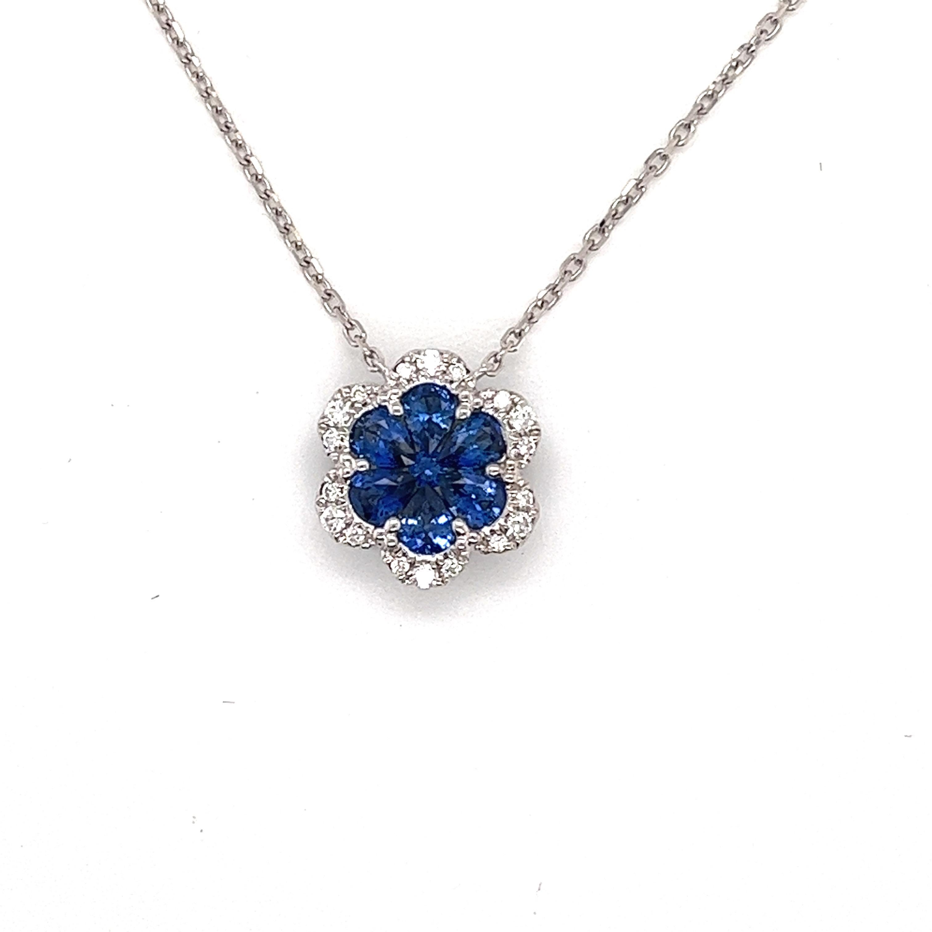 6 pear shape sapphires weighing 1.04 cts
1 round sapphire weighing .04 cts
18 round diamonds weighing .13 cts
H-SI
Set in 18k white gold
Adjustable 16-18 inch white gold chain
3.41 g