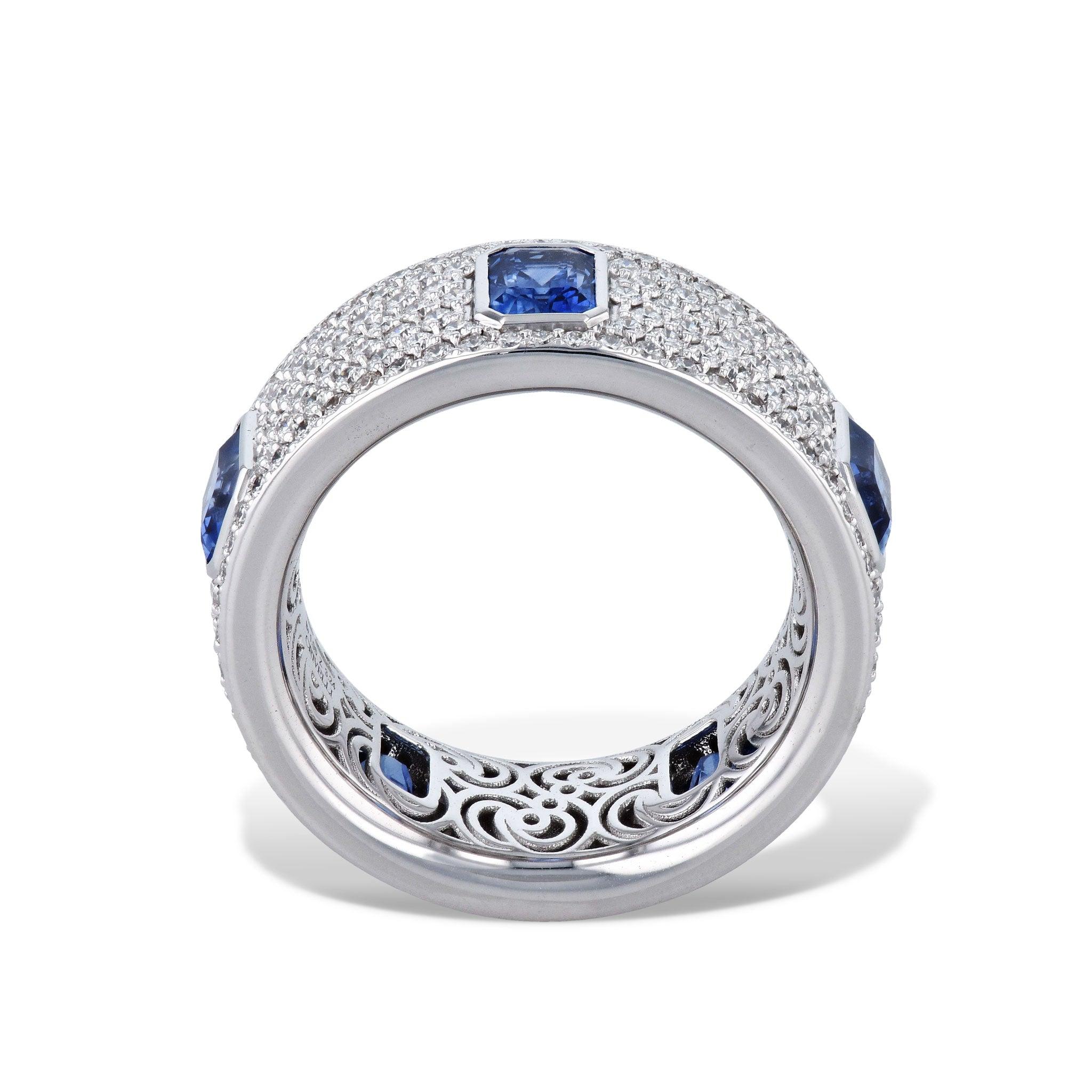 This blue sapphire and diamonds ring is dazzling.
The stones are set in luxurious 18 Karat White Gold.
Blue Sapphire Diamond Pave Ring.

-3.24ct Blue Sapphire.
-1.96ct TW Diamond F-VS.
-18kt. White Gold.

Size 6.75

