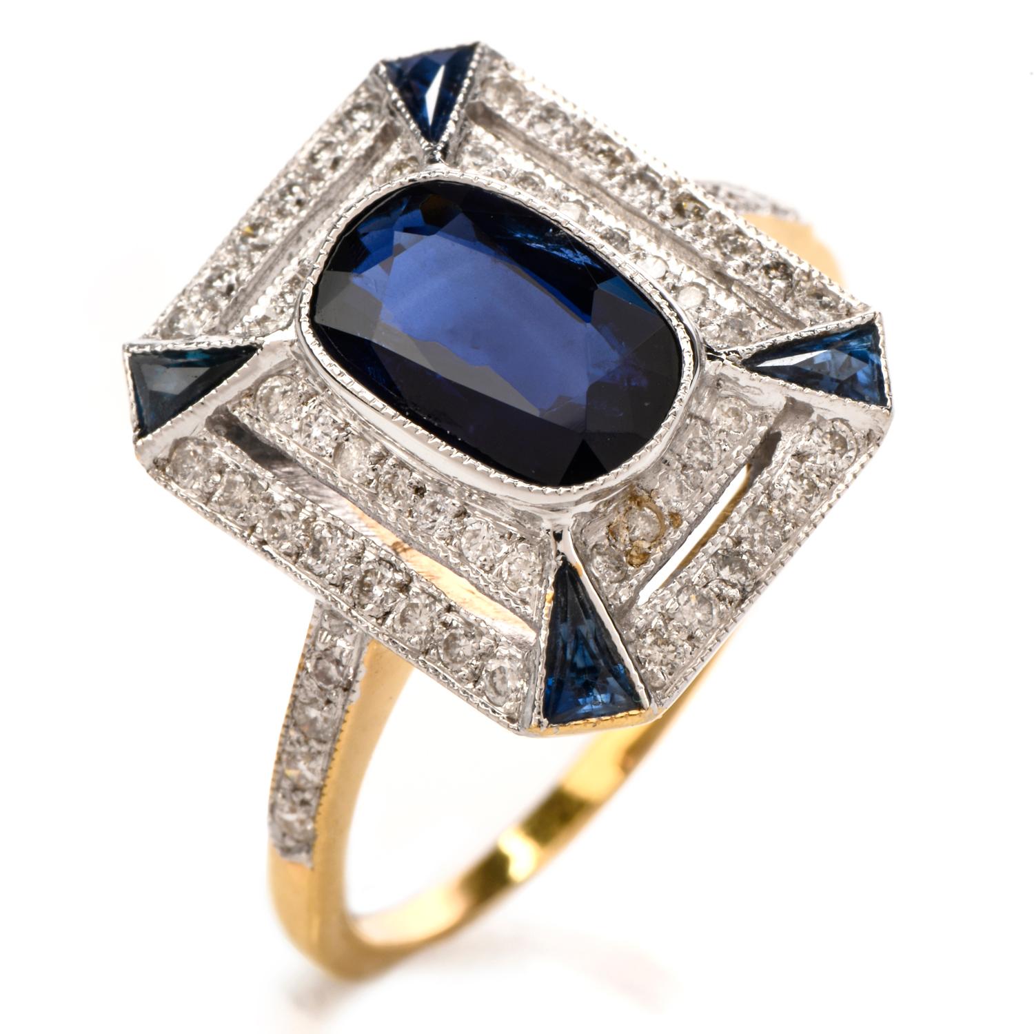 This elegant art deco design blue sapphire and diamond ring is crafted in solid 18-karat yellow gold and white gold top, weighing 4.3 grams and measuring 14mm x 6mm high. Featuring one centered bezel set, oval shaped blue sapphire and 4 bezel set,