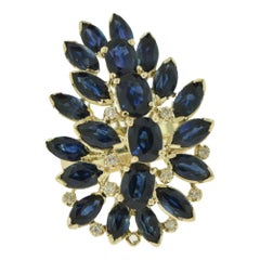 Blue Sapphire and Diamond Ring and 18 Karat Yellow Gold Earring Set