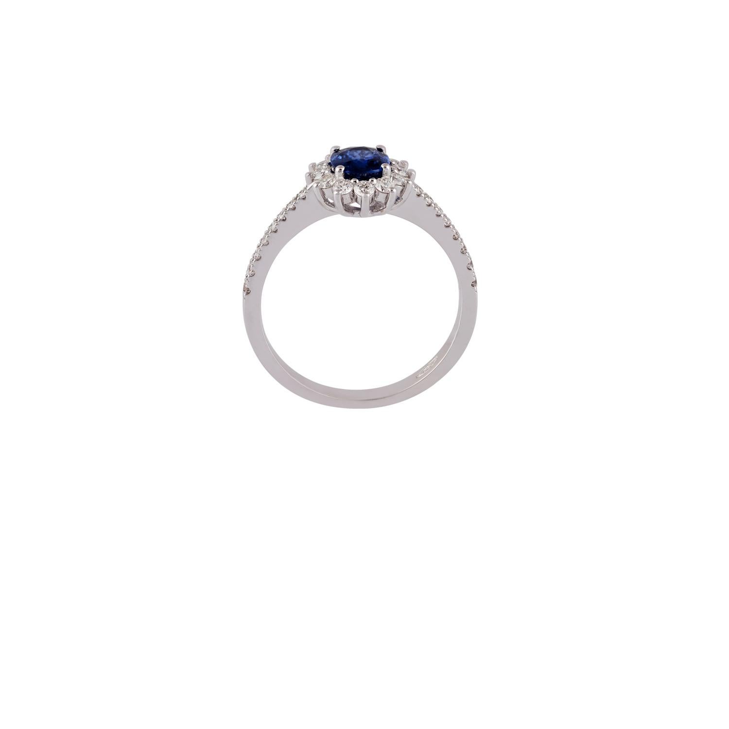 Contemporary Blue Sapphire & Diamond Ring Studded in 18K White Gold For Sale