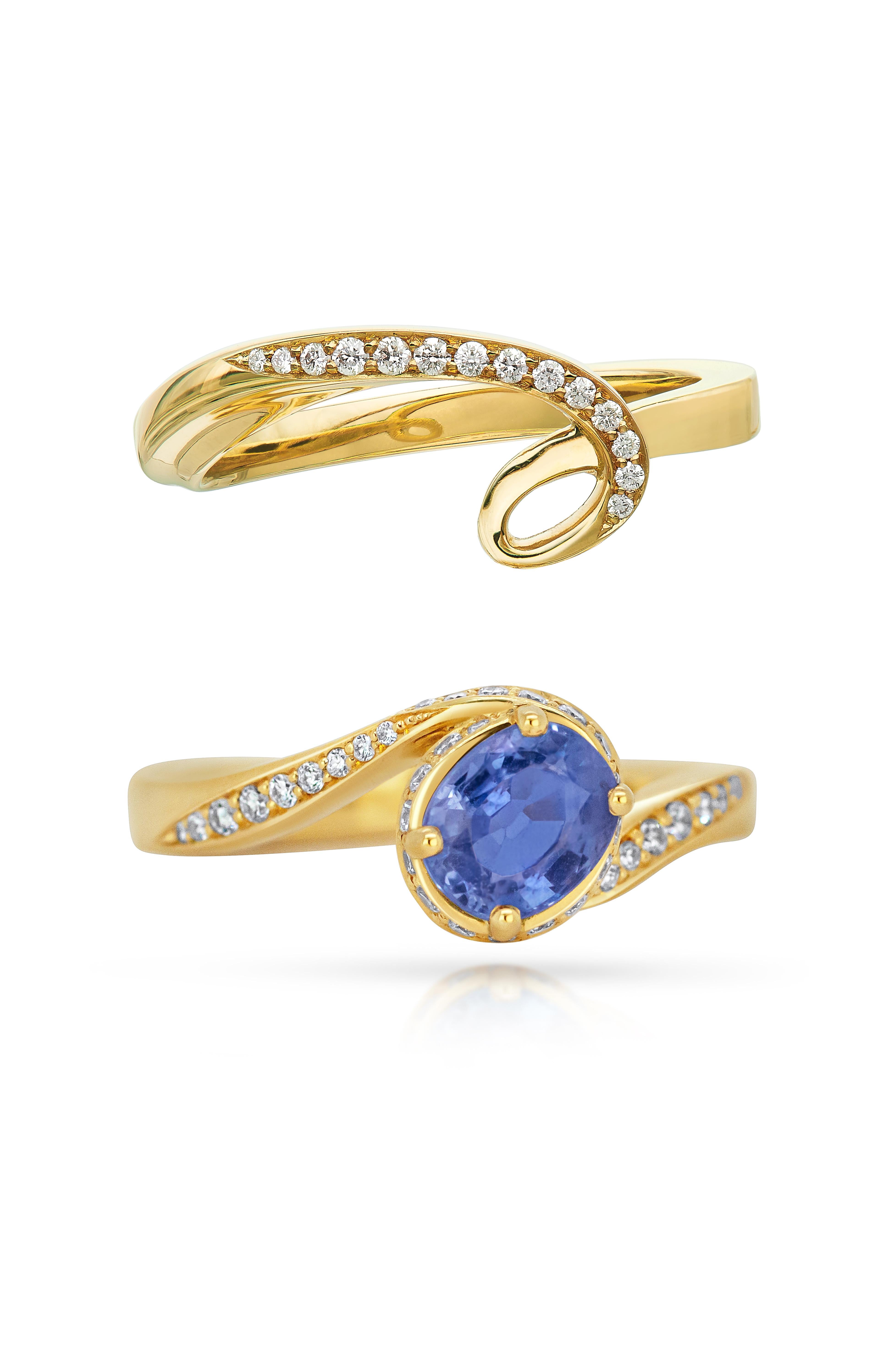 Art Noveau inspired  Itasca solitaire engagement ring and wedding band is a celebration of modern-day love and chance encounters. A continuous flowing line of gold, crosses paths with a perfectly brilliant cut diamond. Their form becomes one, giving