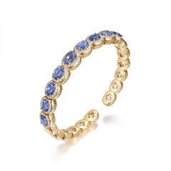 9.49 Carats Blue Sapphire Diamond Bangle Bracelet in 18 Karat Yellow Gold