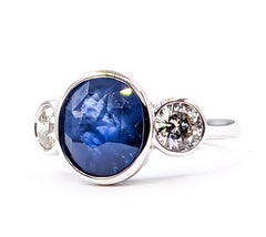 Blue Sapphire & Diamond Three-Stone Ring in Platinum