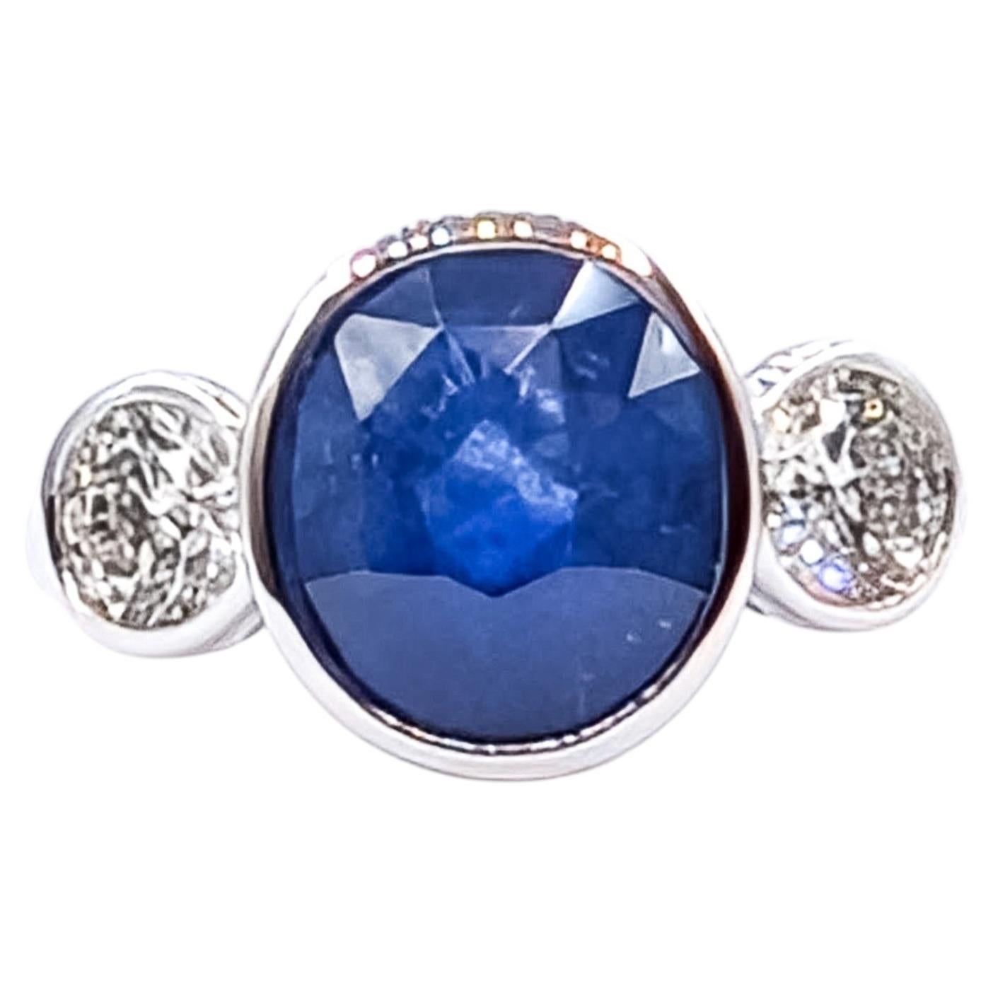 Blue Sapphire & Diamond Three-Stone Ring in Platinum