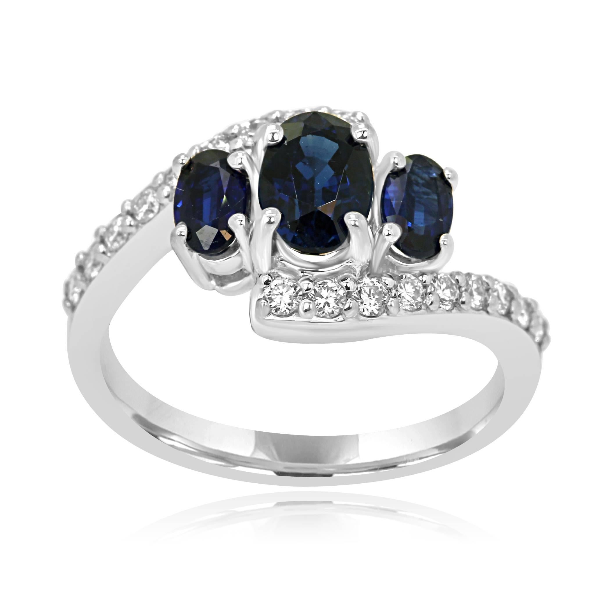 Sapphire Oval 1.24 Carat flanked by 2 sapphire Oval 0.62 Carat with half halo of white round Diamond 0.35 Carat in a 14K White Gold Bridge three stone Fashion Cocktail ring.

Style available in different price ranges. Prices are based on your