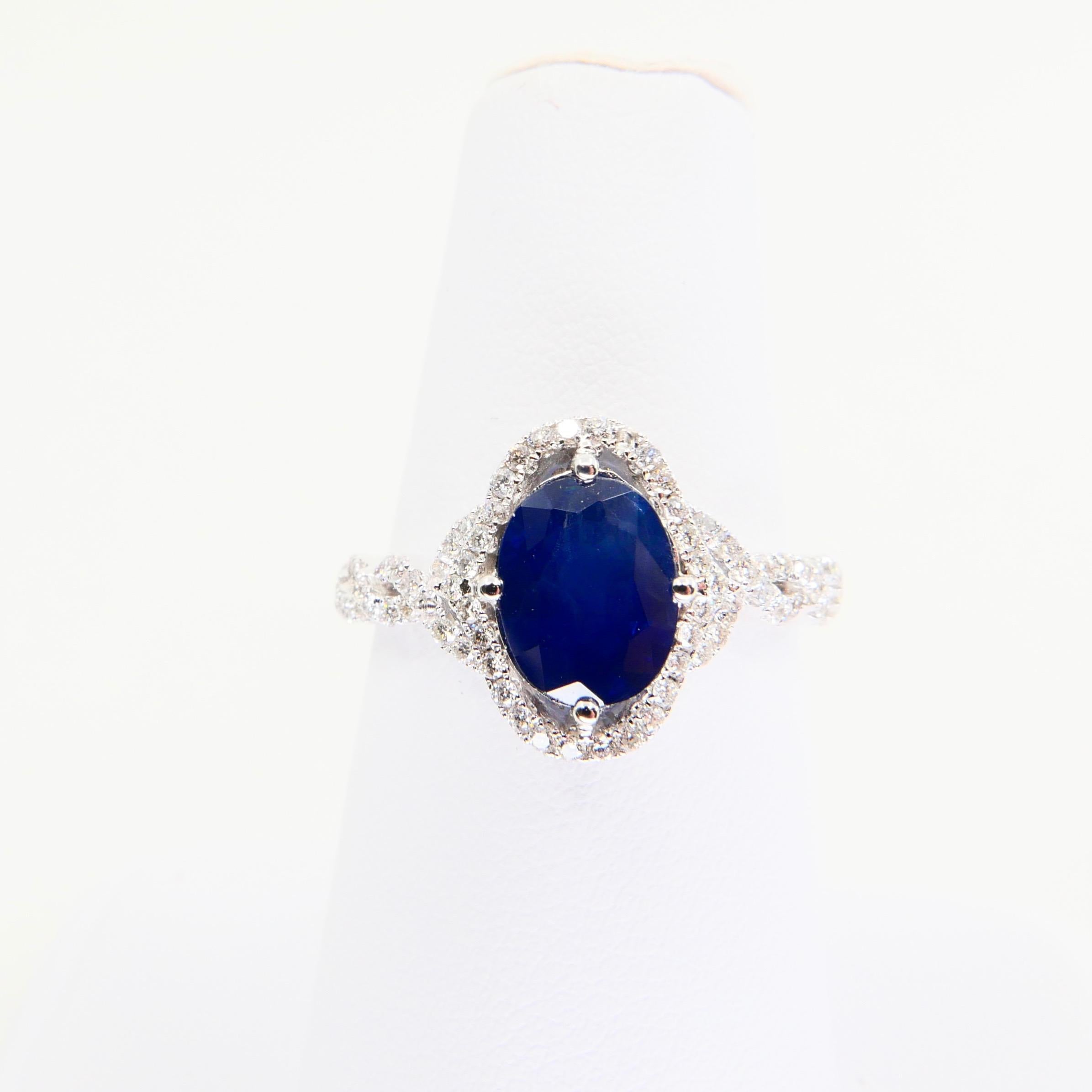 Blue Sapphire and Diamond Twist Ring, 18 Karat White Gold 6