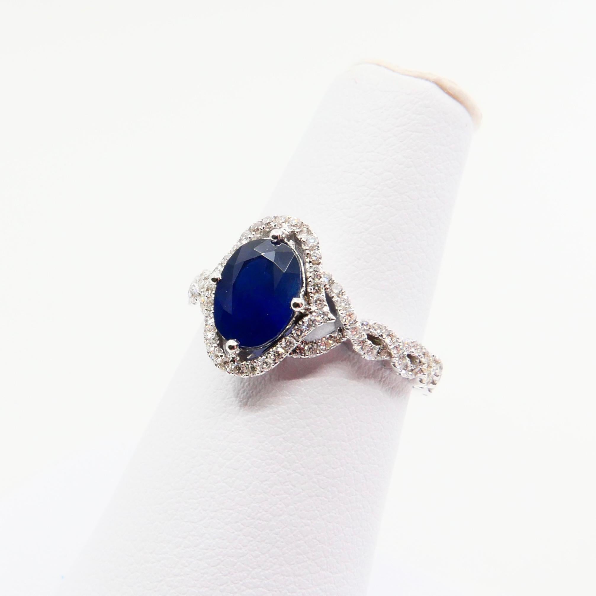 Blue Sapphire and Diamond Twist Ring, 18 Karat White Gold 7