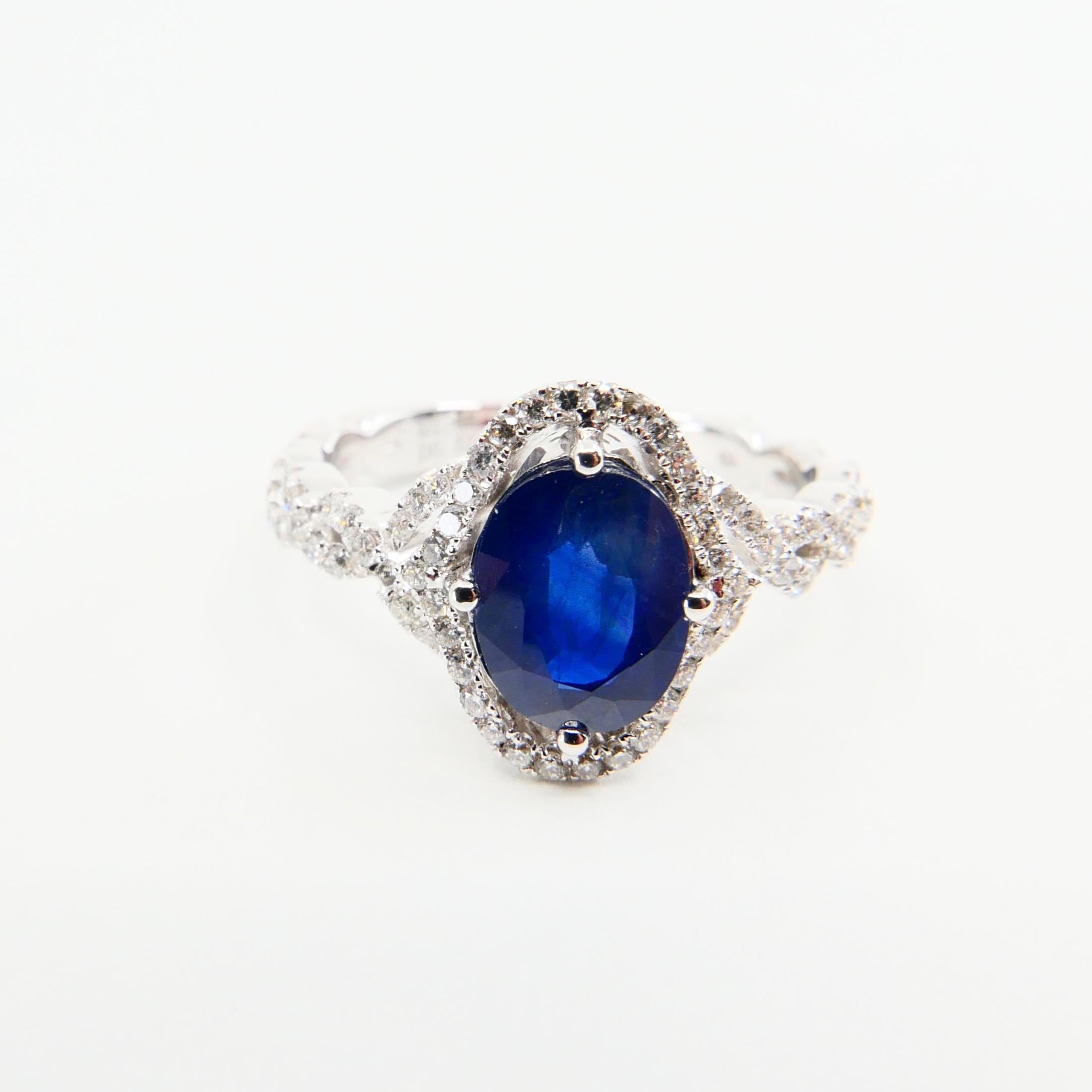 Women's Blue Sapphire and Diamond Twist Ring, 18 Karat White Gold