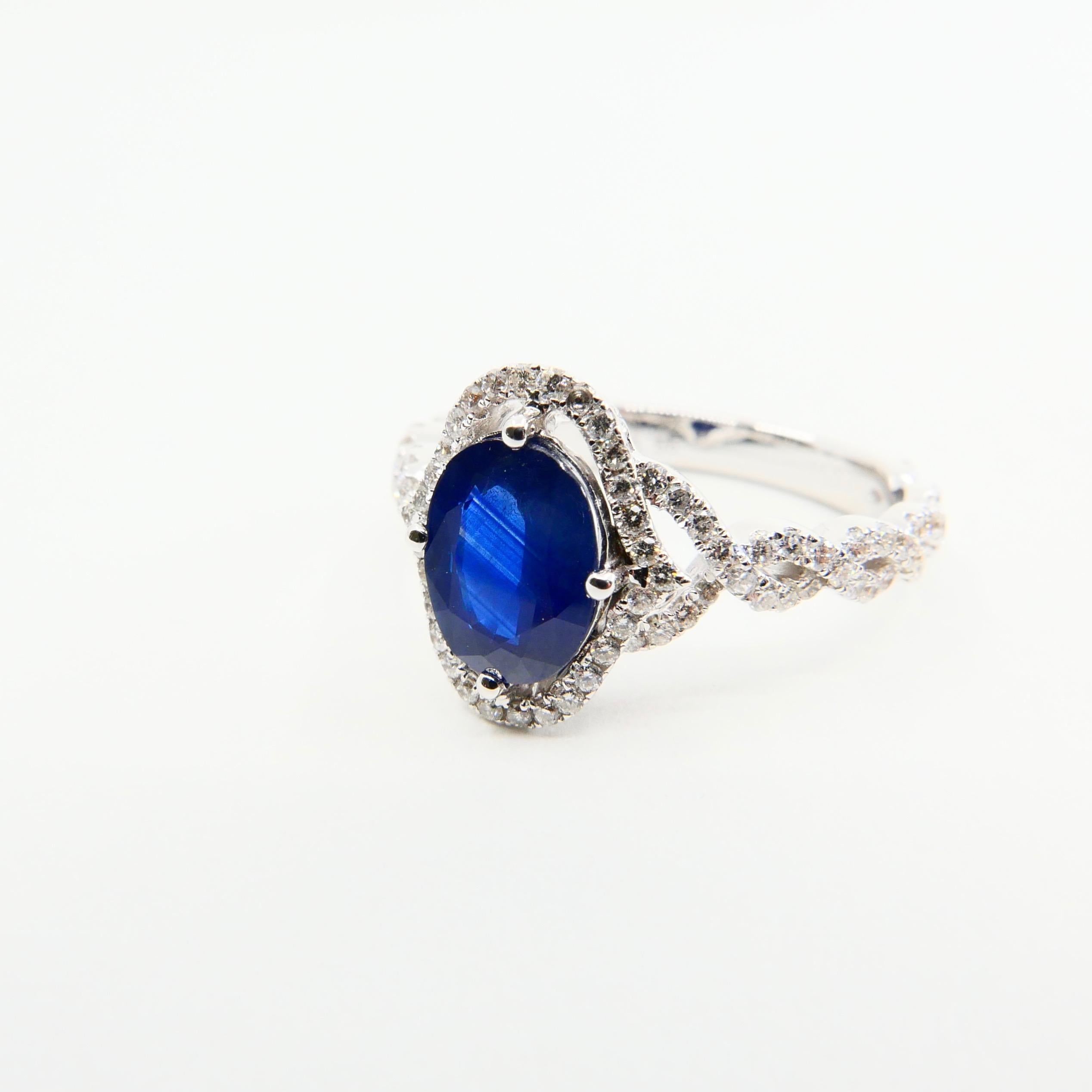 Blue Sapphire and Diamond Twist Ring, 18 Karat White Gold 1