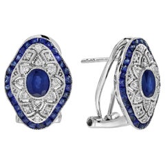 Boucles d'oreilles en or ajouré saphir bleu et diamant d'inspiration Vintage Art Deco