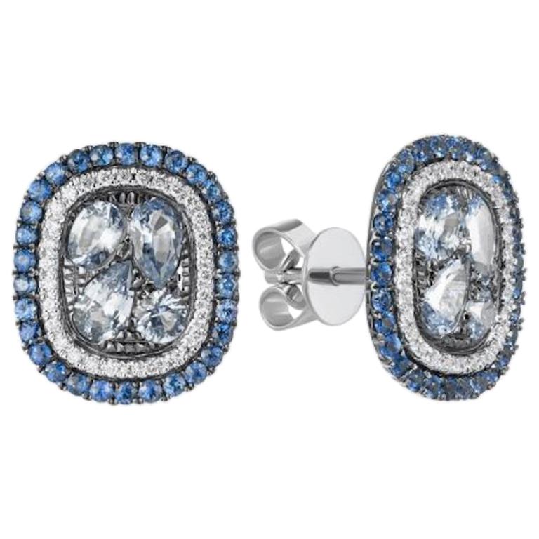 Clous d'oreilles en or blanc avec saphir bleu et diamants