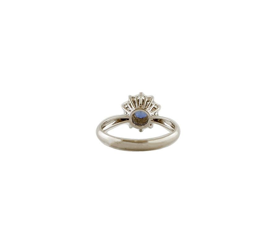 Modern Blue Sapphire, Diamonds, 18 Karat White Gold Engagement Ring For Sale