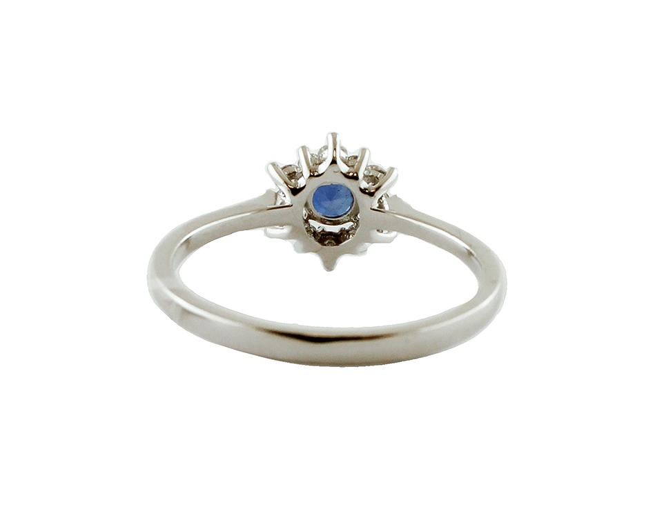 Modern Blue Sapphire, Diamonds, 18 Karat White Gold Engagement Ring