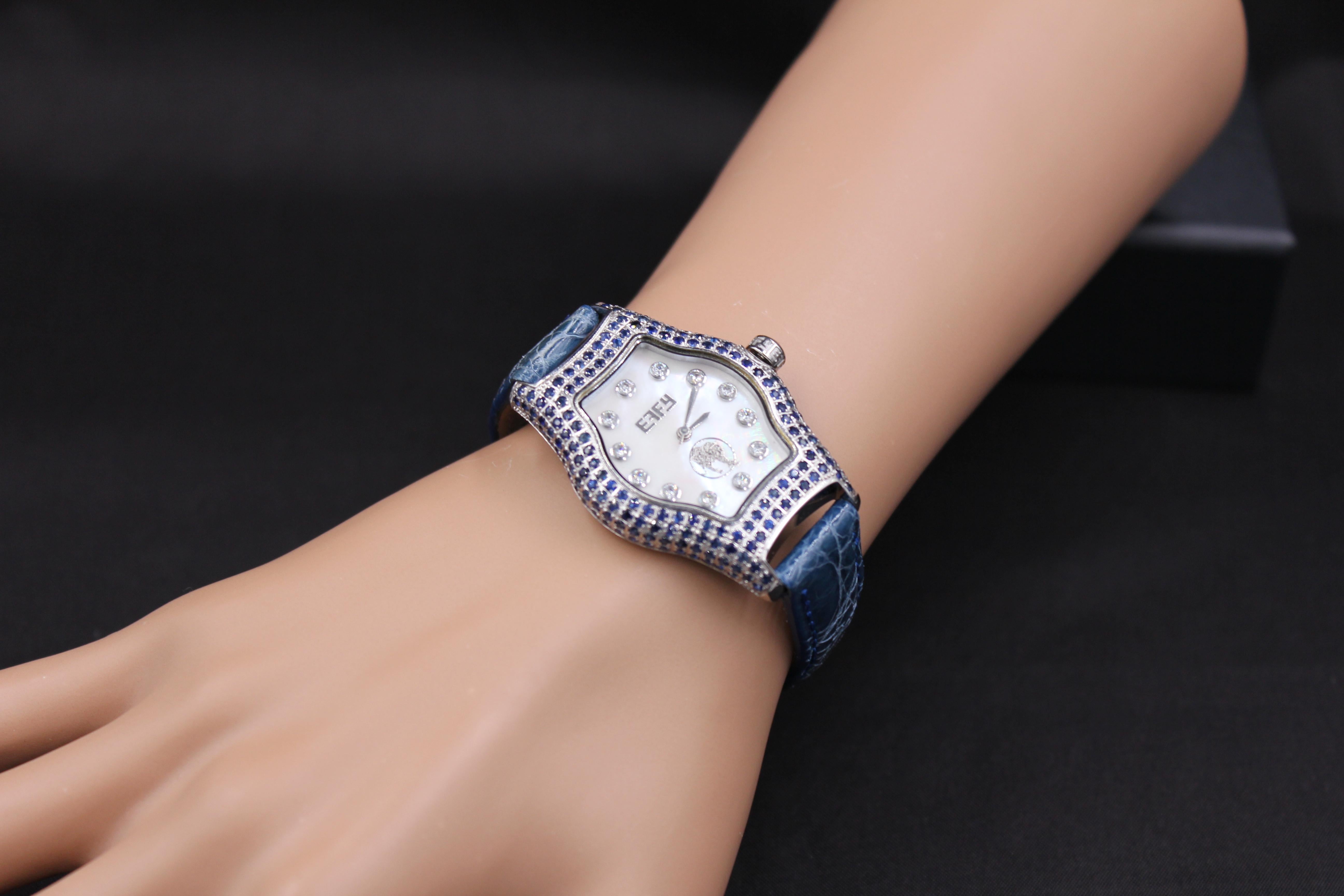 · ·         Quality Swiss-Quartz movement guarantees precision timing
·         Mother-of-Pearl dial micro-paved with diamonds and gemstones enhances any dress style
·         Scratch-resistant sapphire glass lens
·         Genuine exotic crocodile