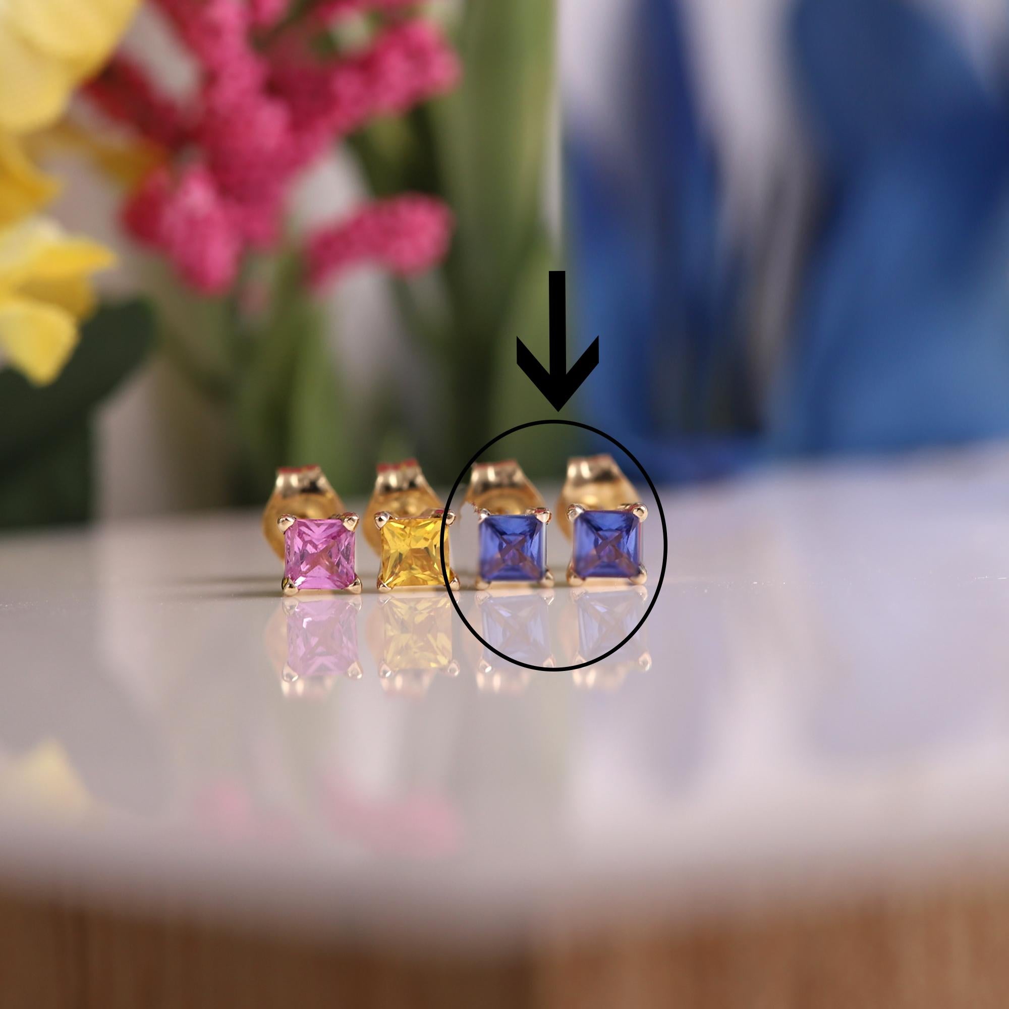 Solid 14k Yellow Gold 
Natural Blue Sapphire Gemstone
1 pair ( 2pieces )
each stone is 3.0 mm approx 0.20 carat 
Square shape
AA Quality Gems
due to natural formations minor inclusions or imperfections may occur
Good for any age
+Gift Box
