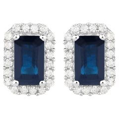 Boucles d
oreilles saphir bleu Halo diamant 0.9 carats Or blanc 14K