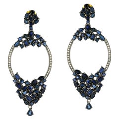 Orecchini con zaffiro blu e diamanti in oro giallo 18k e argento