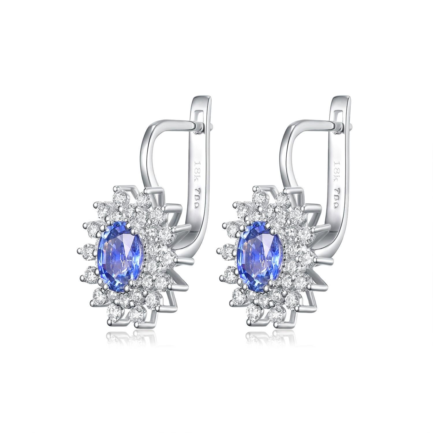 Discover the epitome of elegance with our Blue Sapphire Drop Earrings set in 18 Karat White Gold. These stunning earrings seamlessly unite the timeless allure of blue sapphires with the contemporary sophistication of white gold and diamonds, making