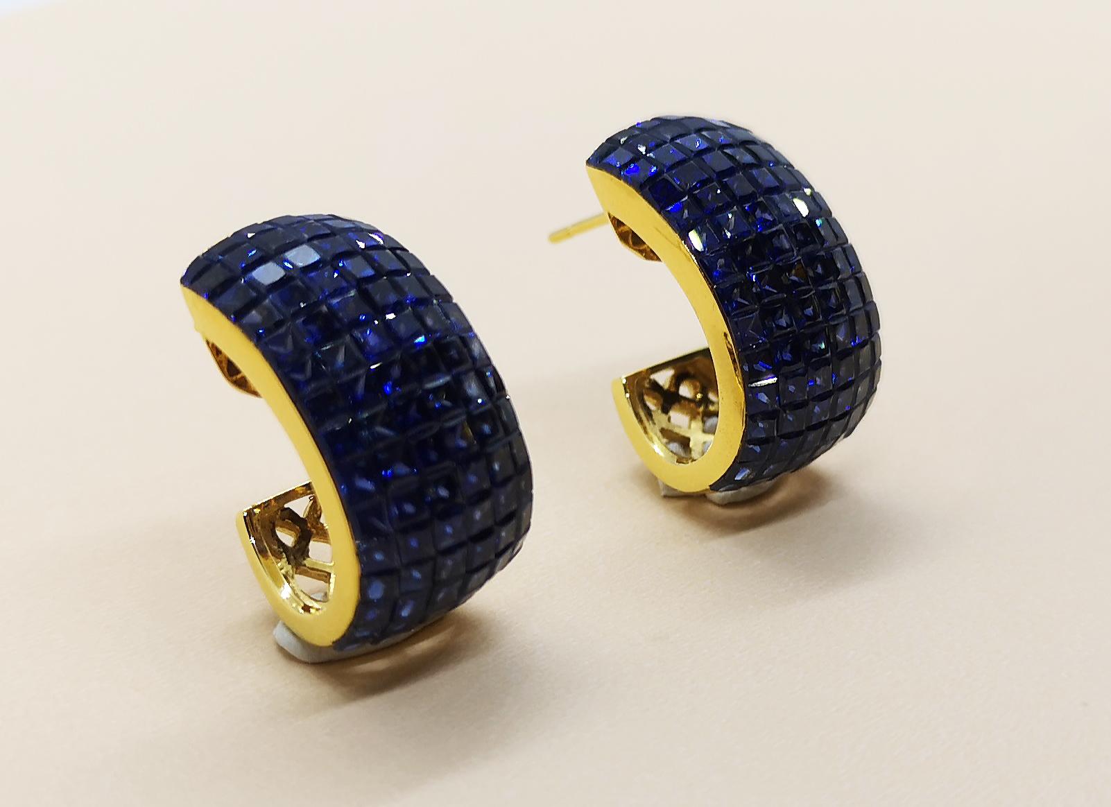 Orecchini con zaffiro blu da 12,97 carati e montatura in oro 18 carati

Larghezza: 1.3 cm
Lunghezza: 2.6 cm 


