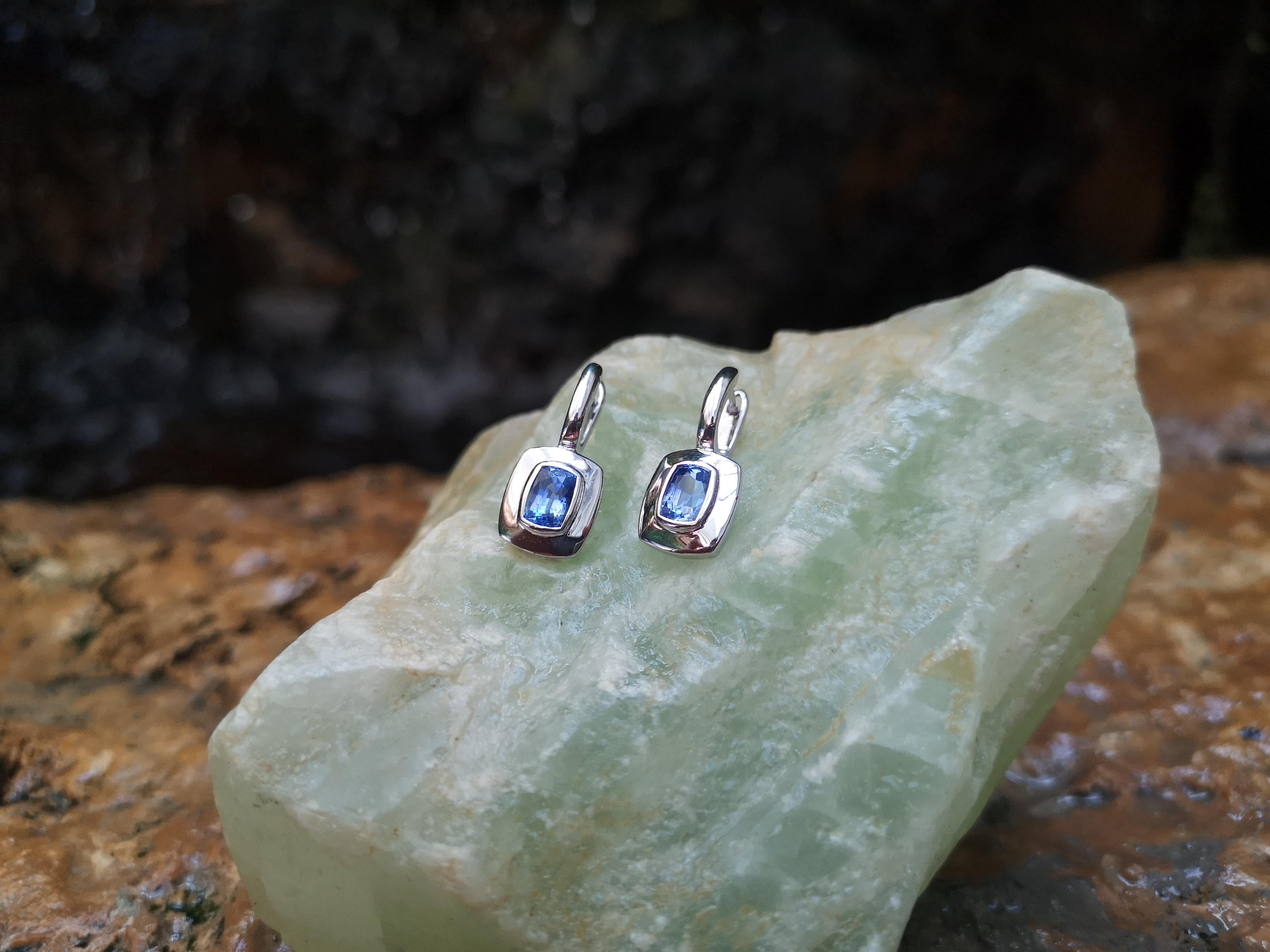 Emerald Cut Blue Sapphire Earrings Set in 18 Karat White Gold Settings For Sale
