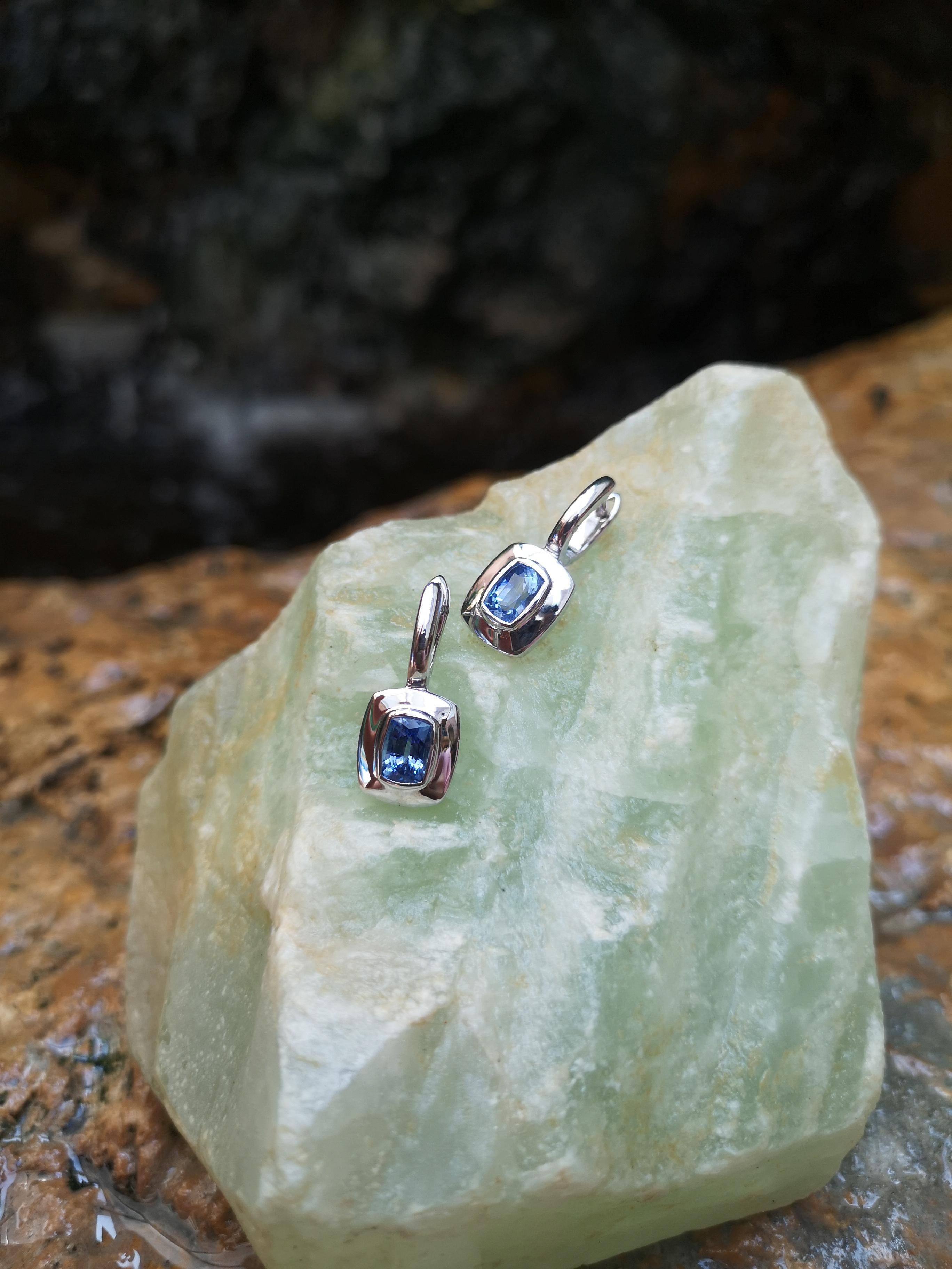Women's Blue Sapphire Earrings Set in 18 Karat White Gold Settings For Sale