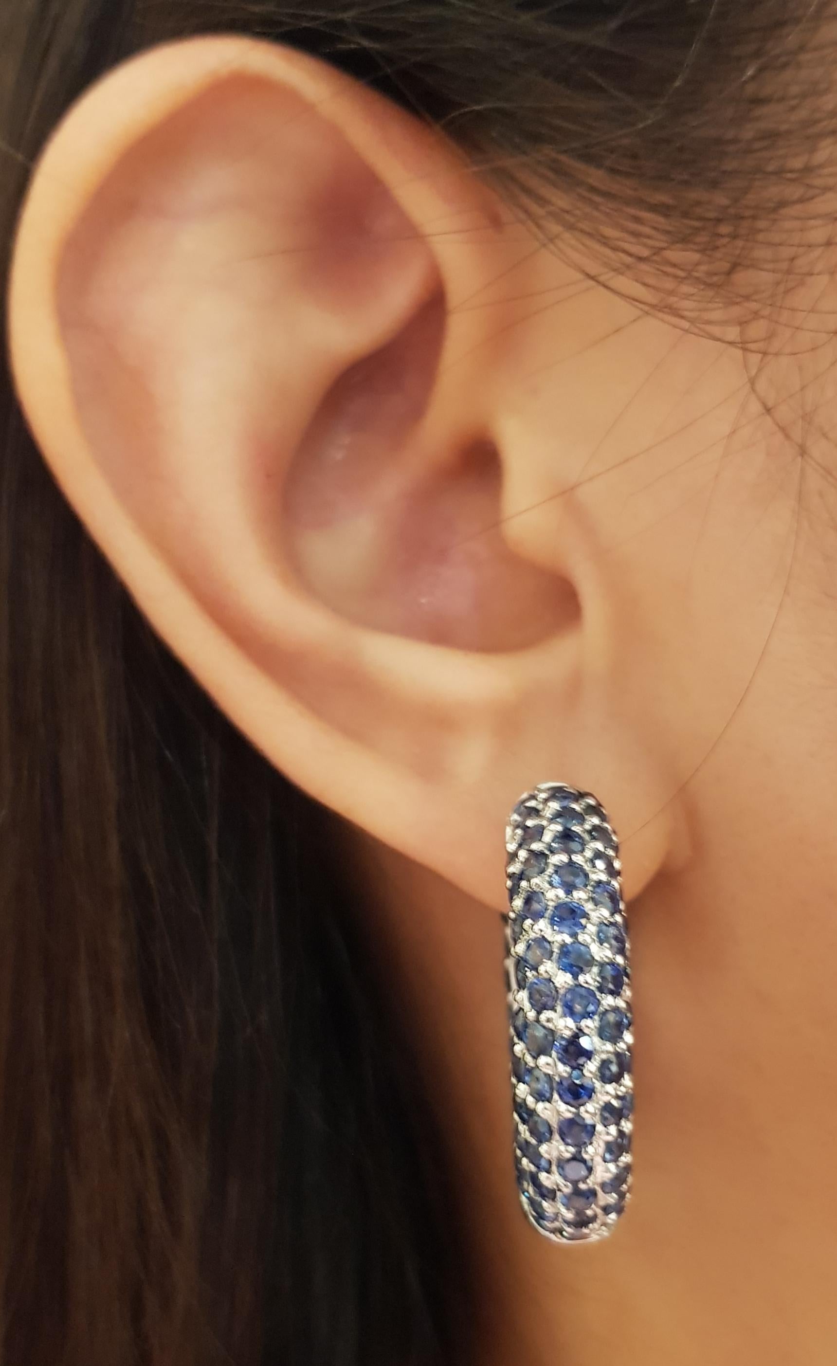 Blue Sapphire 19.14 carats Earrings set in Silver Settings

Width: 0.7 cm 
Length: 2.7 cm
Total Weight: 16.3 grams

*Please note that the silver setting is plated with rhodium to promote shine and help prevent oxidation.  However, with the nature of