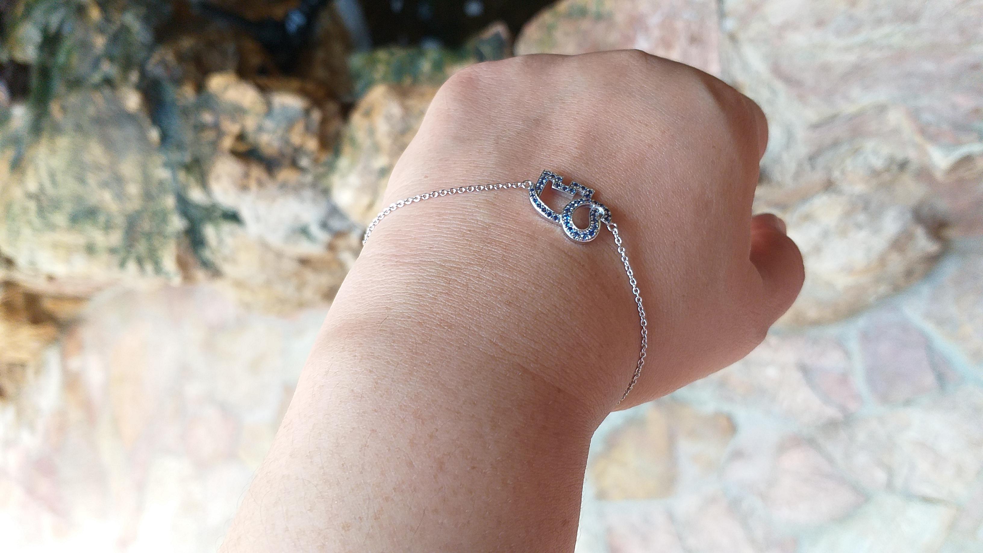 Blue Sapphire Bracelet set in Silver Settings

Width:  1.3 cm 
Length: 7.0 cm
Total Weight: 1.65 grams


*Please note that the silver setting is plated with rhodium to promote shine and help prevent oxidation.  However, with the nature of silver,