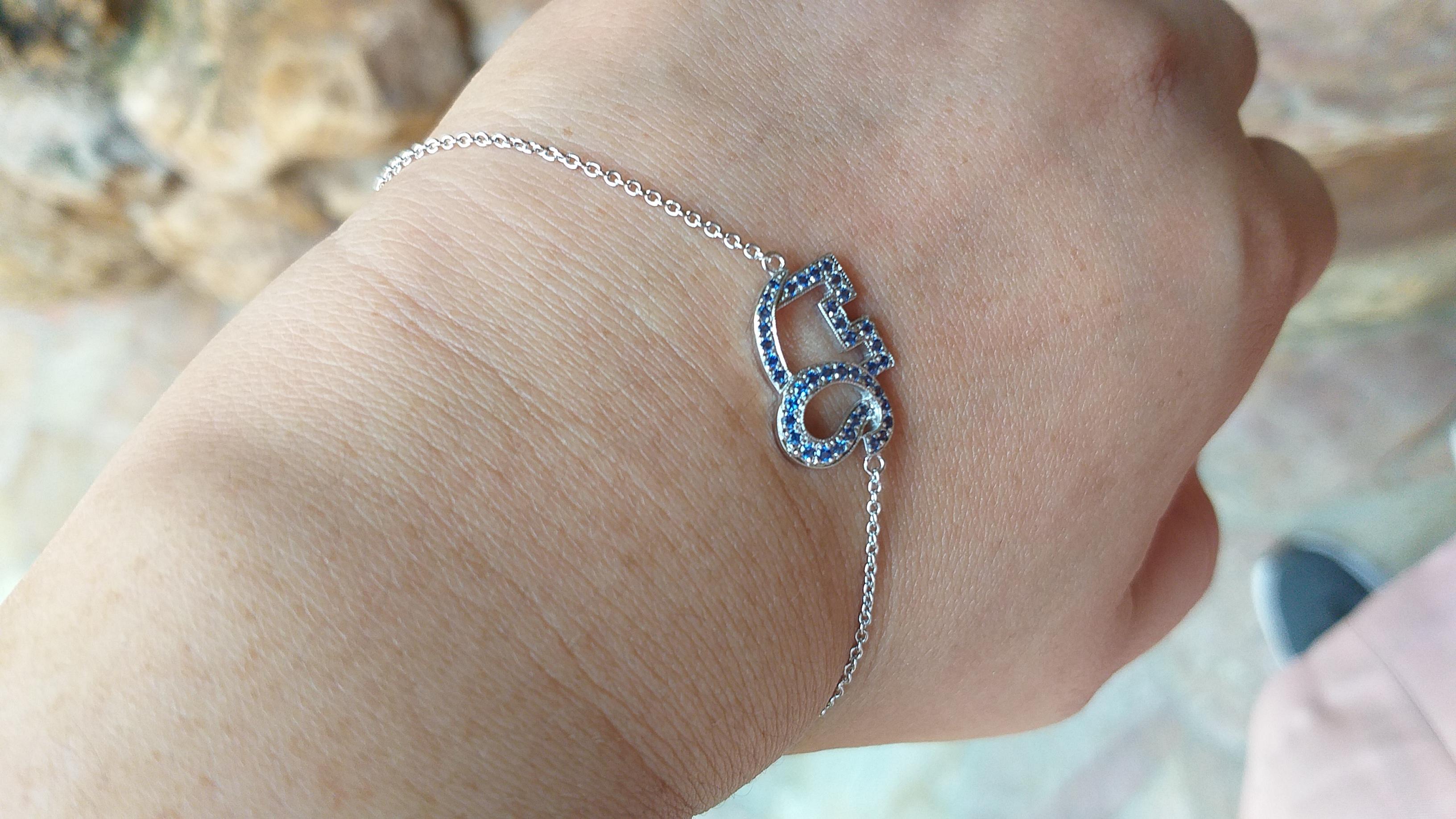 Brilliant Cut Blue Sapphire Elephant Bracelet set in Silver Settings For Sale