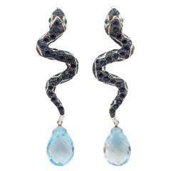 Boucles d'oreilles serpent en argent serties de saphirs bleus, d'émeraudes et de topazes bleues