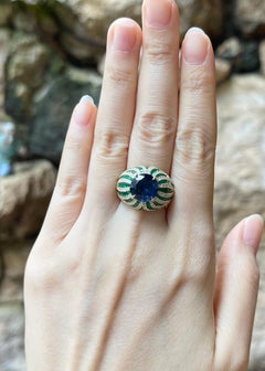 Blue Sapphire, Emerald and Diamond Ring set in 18K Gold Settings