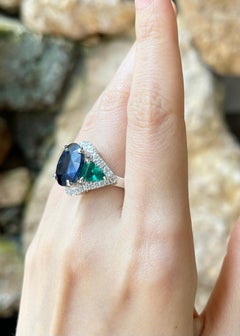 Blue Sapphire, Emerald and Diamond Ring set in Platinum 950 Settings