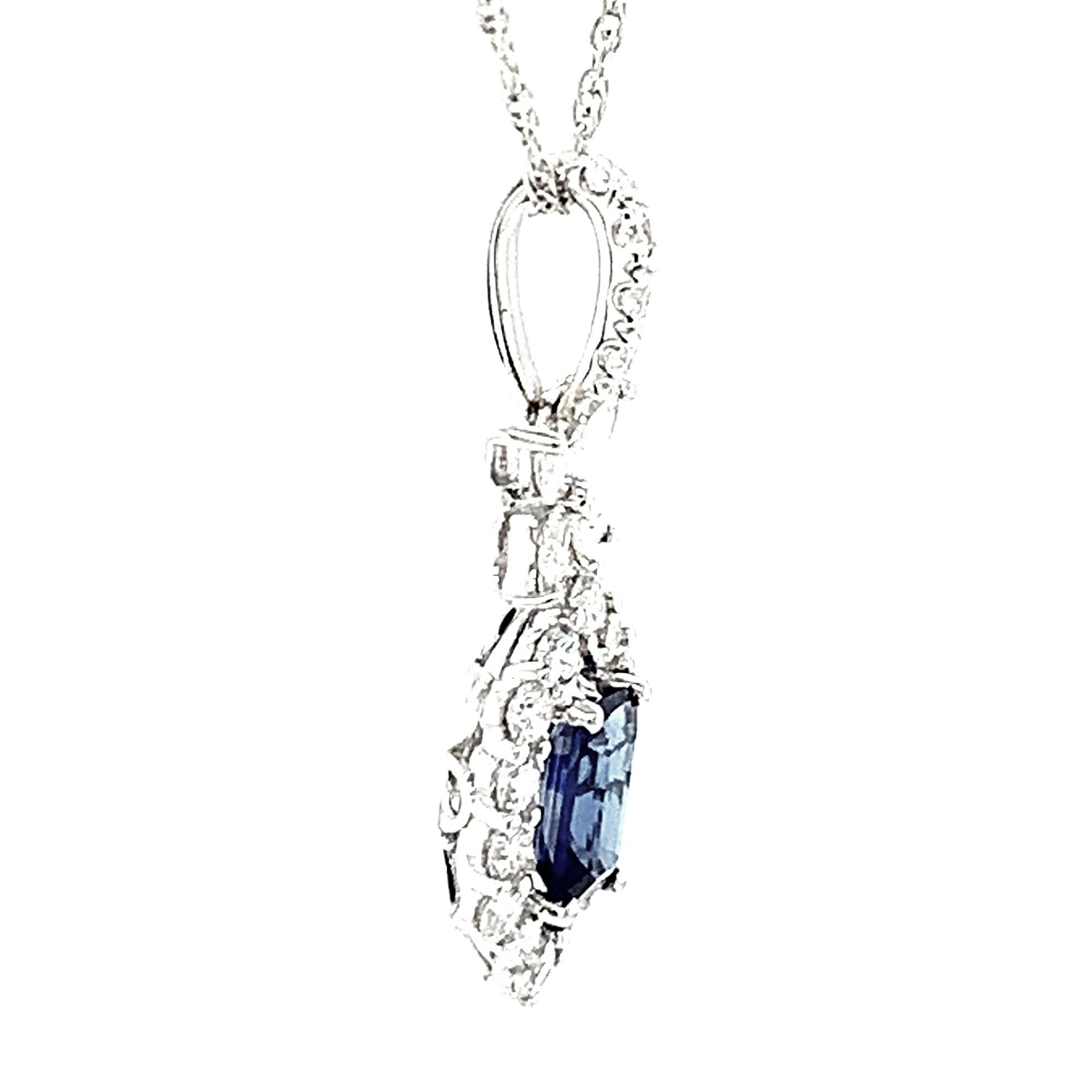 Artisan Blue Sapphire and Diamond Halo Pendant in White Gold with White Gold Chain For Sale