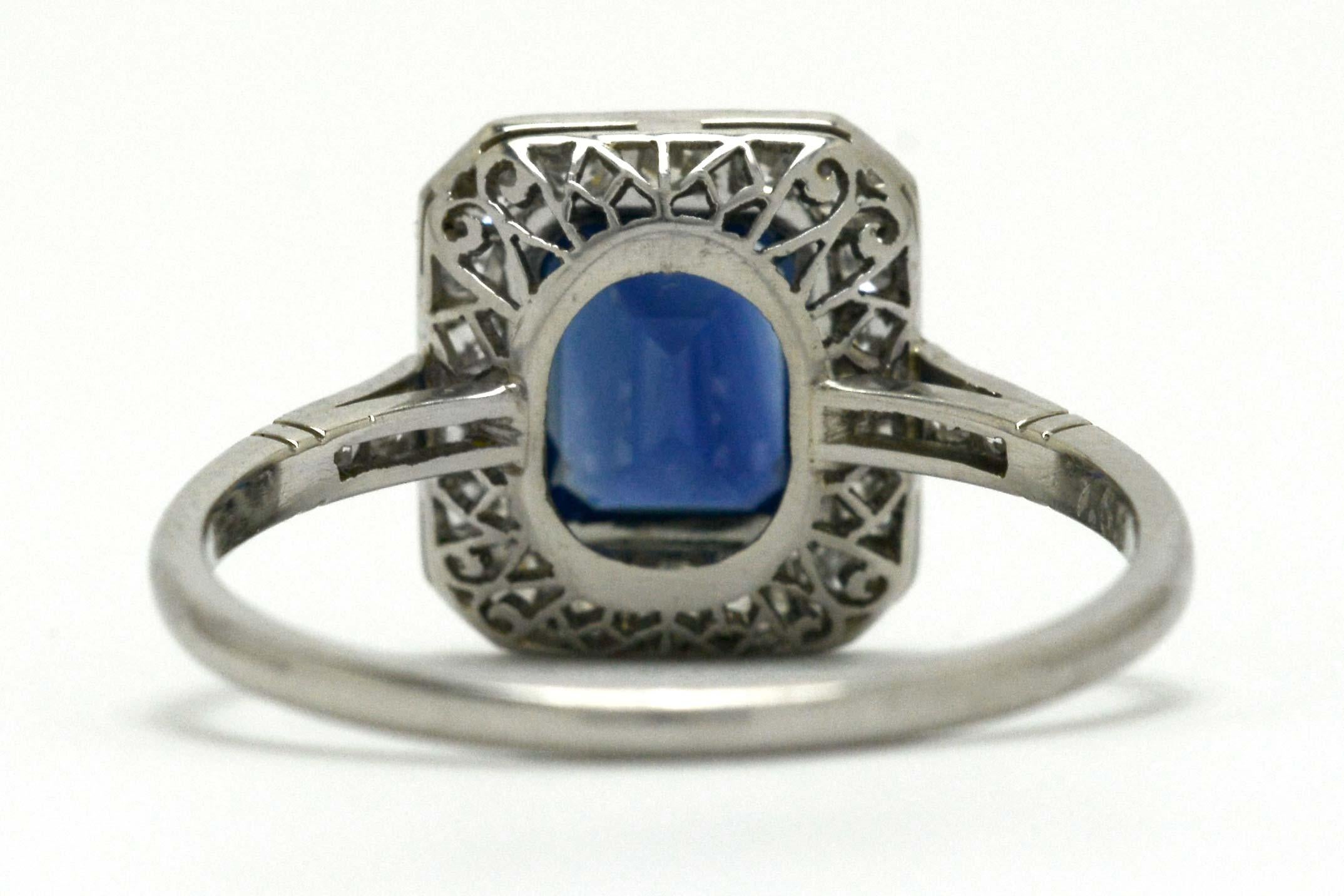 Women's Blue Sapphire Emerald Cut Platinum Art Deco Revival Diamond Halo Engagement Ring
