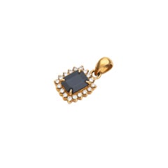 Blue Sapphire Emerald Cut & Round Diamond Halo Pendant in 14K Yellow Gold
