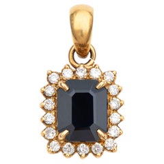Blue Sapphire Emerald Cut & Round Diamond Halo Pendant in 14K Yellow Gold