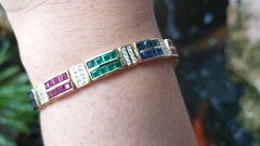 Blue Sapphire, Emerald, Ruby and Diamond Bracelet Set in 18 Karat Gold Settings