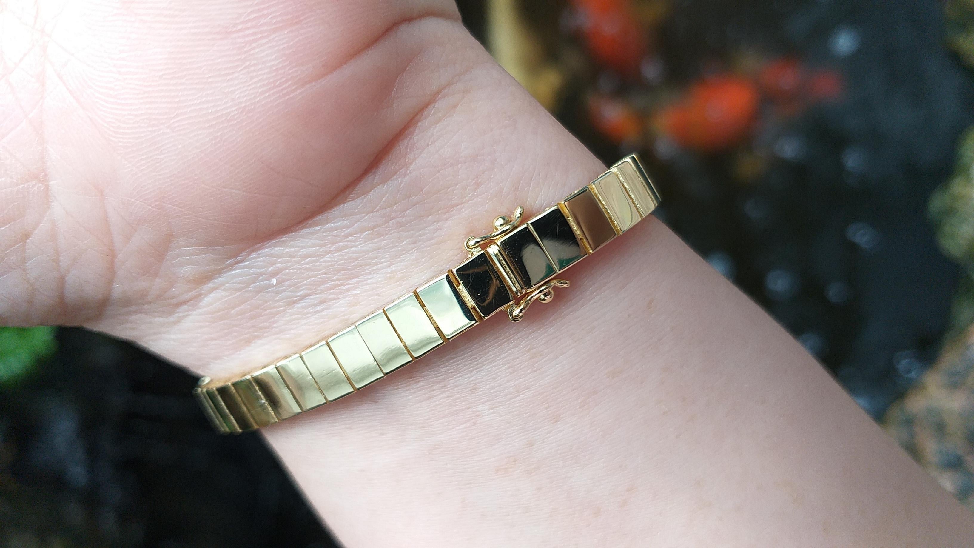 Armband aus 18 Karat Gold mit blauem Saphir, Smaragd, Rubin und Diamanten Damen im Angebot