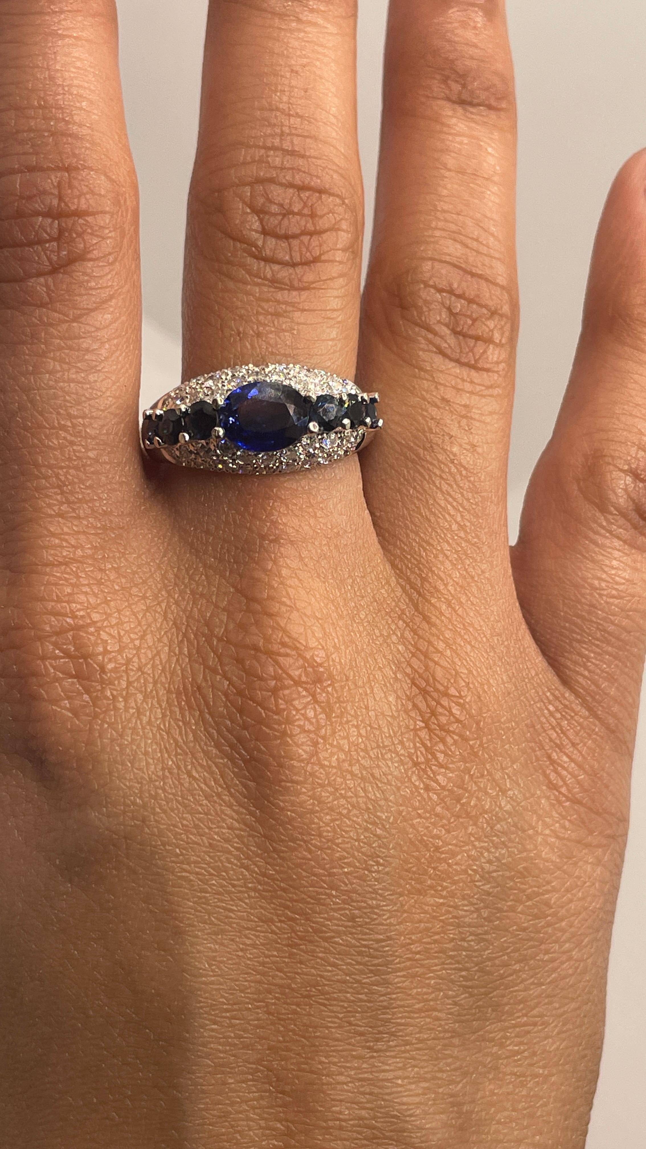 For Sale:  Blue Sapphire Engagement Ring with Diamonds in 18K White Gold 4