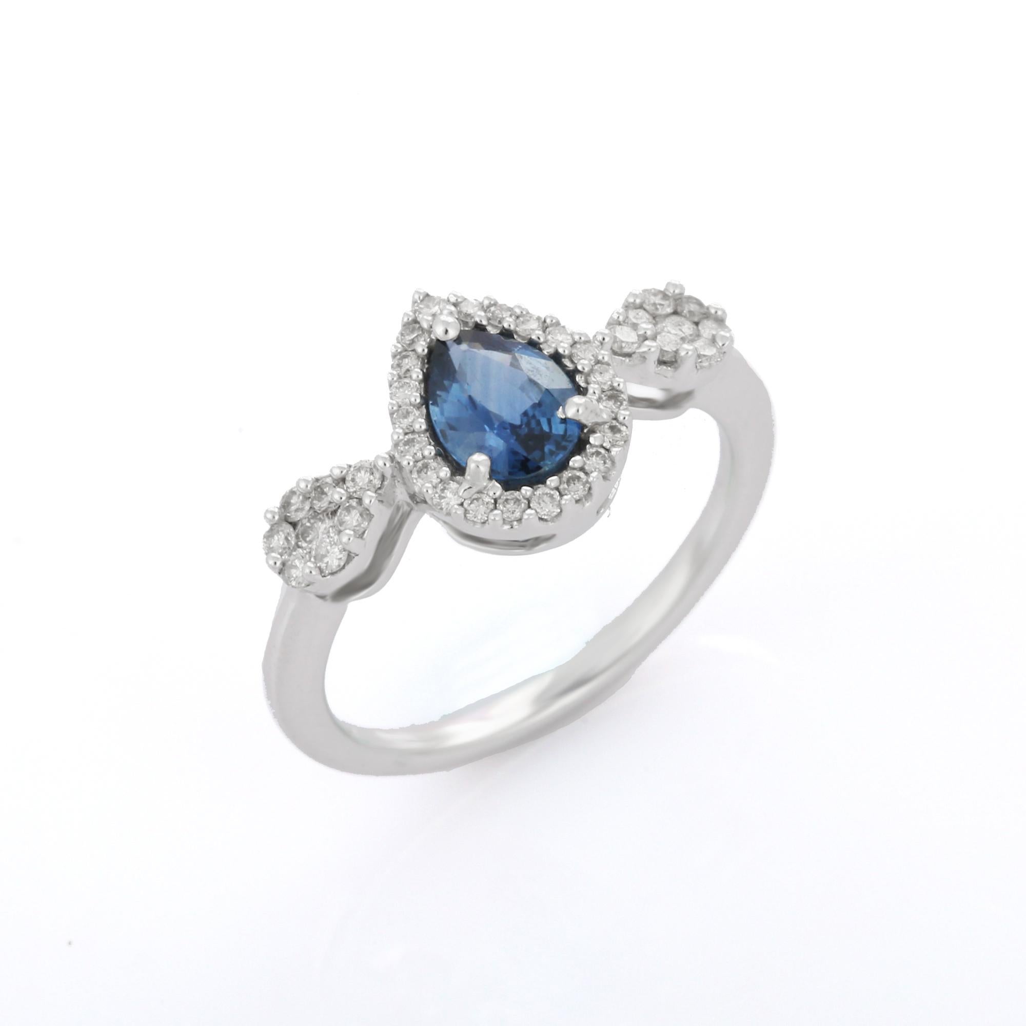 For Sale:  Blue Sapphire Engagement Ring, Ringed with Diamonds in 18K White Gold  5